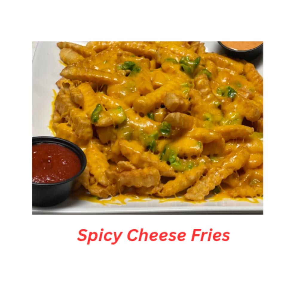 A plate of golden spicy cheese fries with green peppers, served with red and orange dipping sauces.