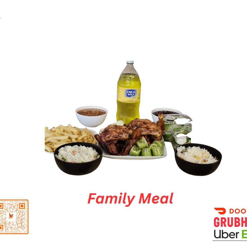 Halal Boyz family meal with two whole roasted chickens, rice, fries, beans, salad, and Inca Kola.