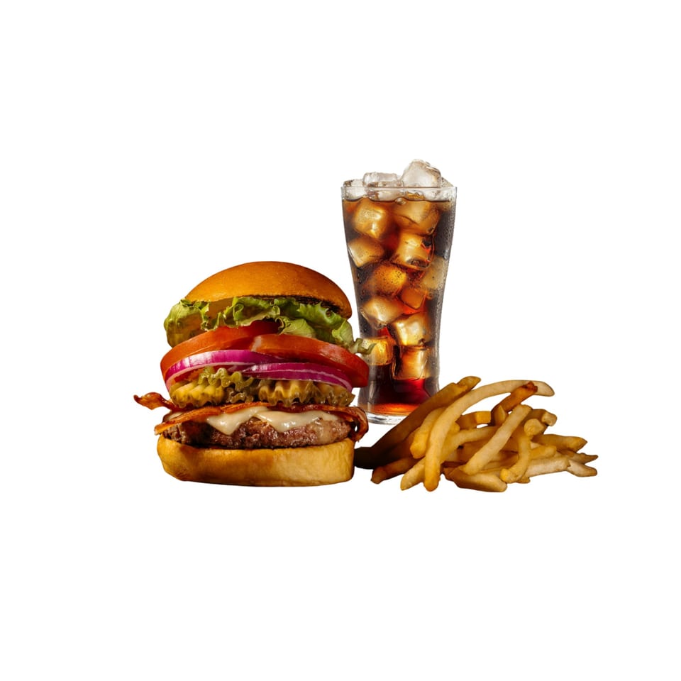 Halal burger with bacon, cheese, lettuce, tomato, onion, pickles, fries, and a soda.