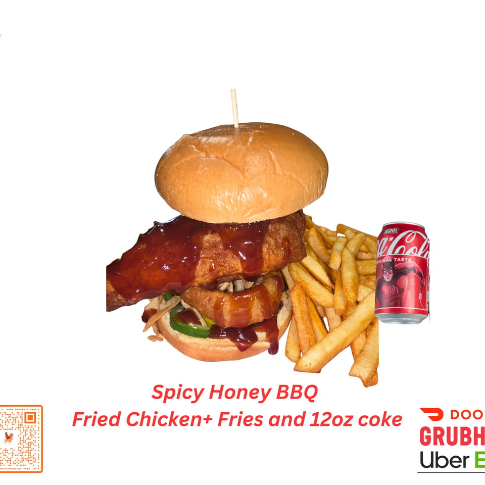 Spicy Honey BBQ fried chicken sandwich with onion rings, fries, and a Marvel Coca-Cola can.